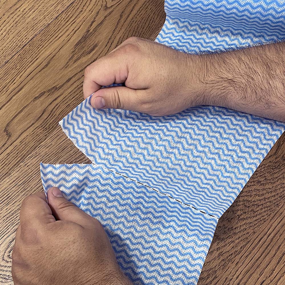 Glass Towels cleaning a windshield