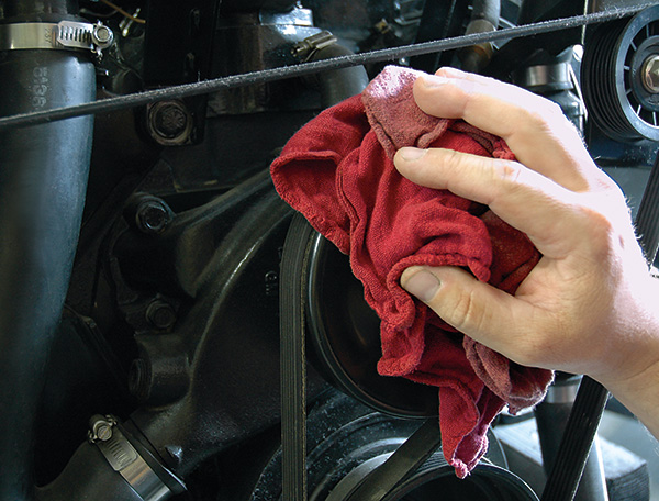 Buffalo Shop Towel and Hand on Engine