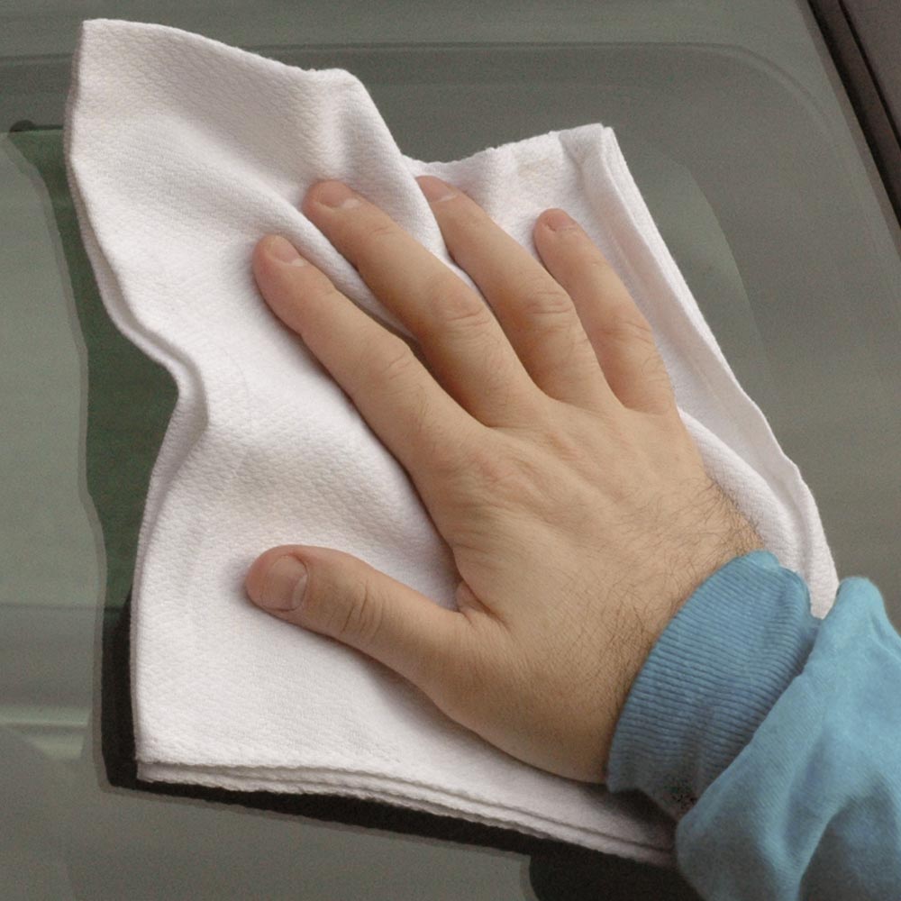 Glass Towels cleaning a windshield