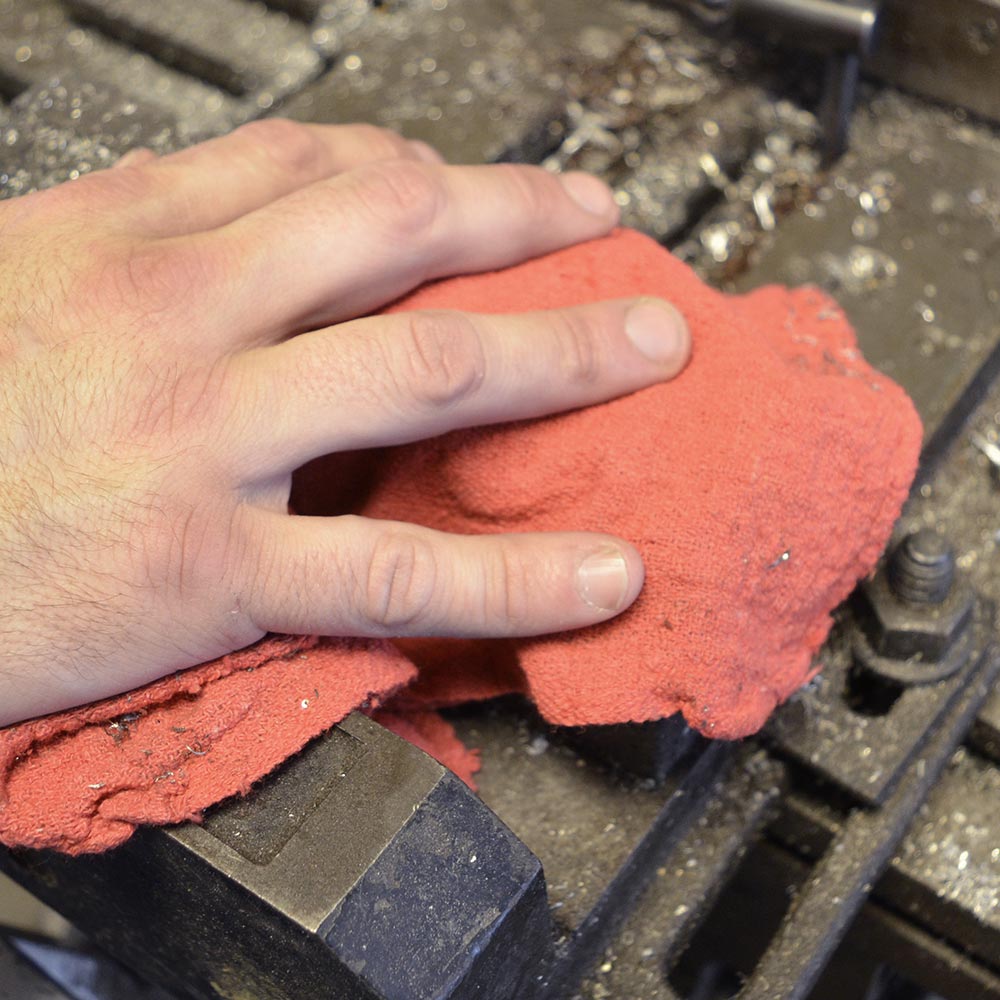 Red Shop Towel on grimy equipment